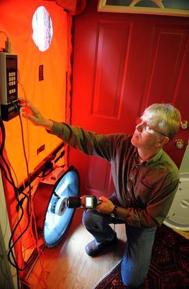 Flemming Lund performing a blower door test in Concord, MA. 