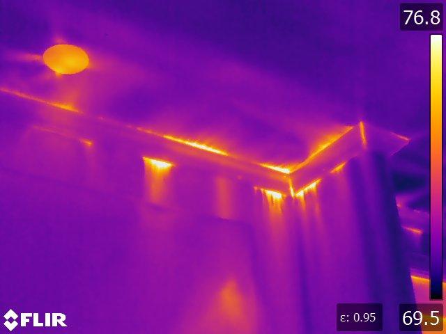 Summer time energy audits are still possible! Seen from the inside one can see all the heat leaking into this Boston, MA home.
