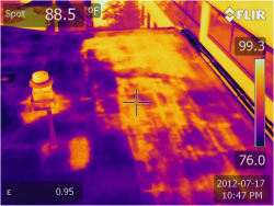 Heat loss on a flat roof seen through infrared services provided by Infrared Diagnostic of Massachusetts.